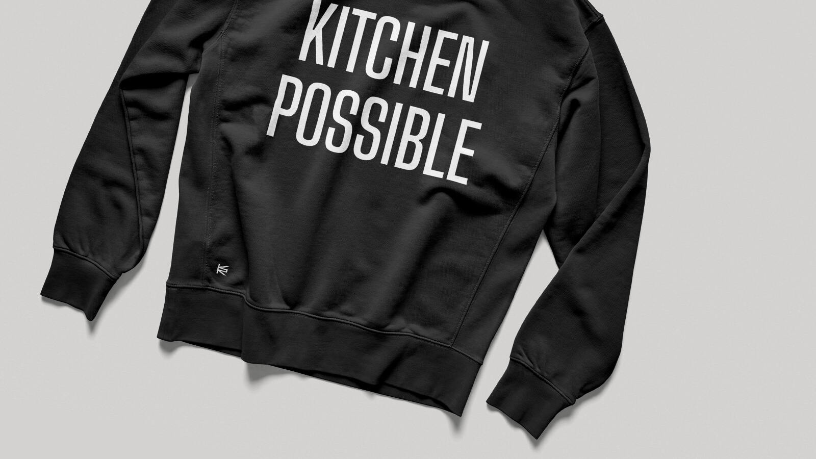 Passt dem Team und passt zum Corporate Design. Die neuen Klamotten der Küchenprofis.