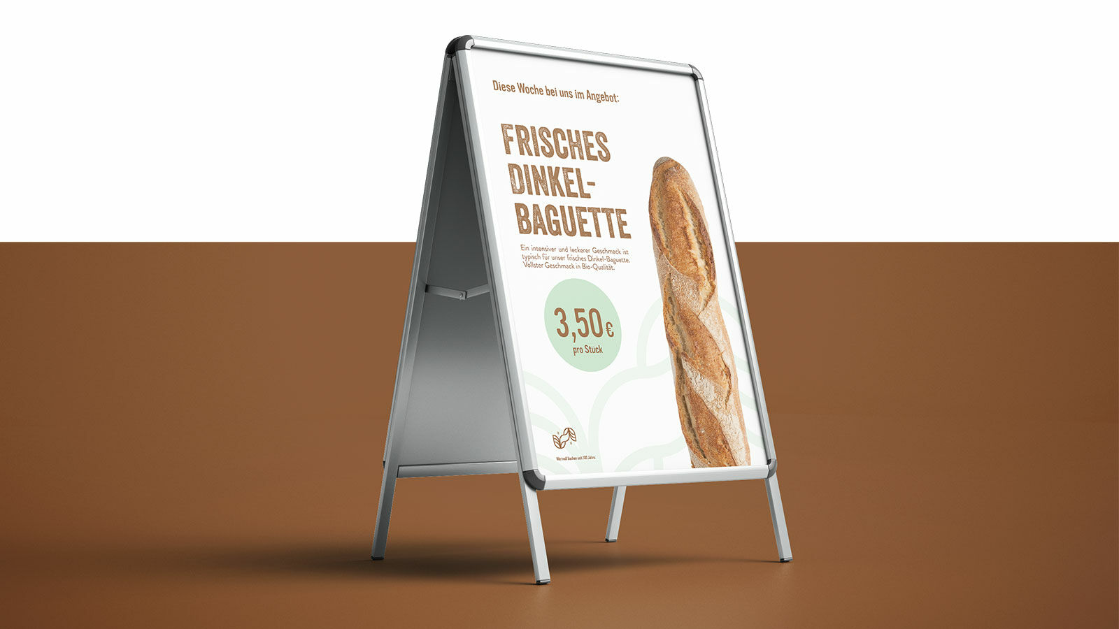 Kundenstopper von Schneider mit dem Wochenangebot frisches Dinkel-Baguette für 3,50 Euro.